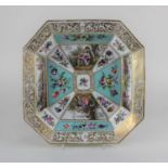 A KPM porcelain bowl decorated with panels of courting couples and floral sprays, with gilt