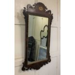 A George III mahogany fret cut wall mirror with flower head surmount (a/f) 100cm
