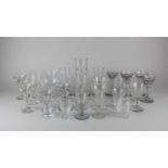 A collection of assorted drinking and other glasses, to include a set of four with deceptive bowls