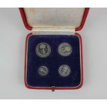 A Maundy Money four coin set for 1948 in original red leather box