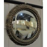 A circular gilt plaster framed convex wall mirror mirror plate 38cm diameter