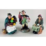 Three Royal Doulton figures comprising The Old Balloon Seller, Town Crier and Fortune Teller