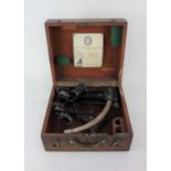 An early 20th century Naval sextant by Herbert Boddy Nauctical Optician, Hull, in original wooden