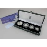 A Royal Mint UK 2001 silver proof Britannia four coin collection comprising of two pounds, one