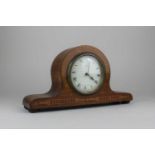 An Edwardian inlaid mahogany and marquetry 8 day mantle clock