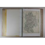A collection of thirteen English county maps from the Weekly Dispatch Atlas unframed in album
