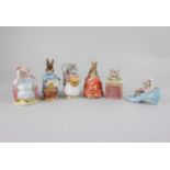 Four Beswick Beatrix Potter figures comprising Poorly Peter Rabbit, Cecily Parsley, The Old Woman