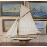 A Nauticalia London model yacht on wooden stand height 120cm including stand, width 120cm (a/f)