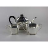 A George VI silver three piece tea set, maker Frank Cobb & Co Ltd., Sheffield 1940 and 1939,