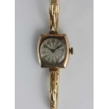A Rolex 9ct gold cased ladies wristwatch, the jewelled movement detailed 'Rolex Prima Timed 6