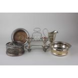 Silver plated tableware to include three various wine coasters (a/f) an egg cup stand and a cream