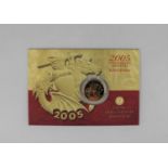 A Royal Mint 2005 UK 22ct Gold Bullion Sovereign in original card packaging