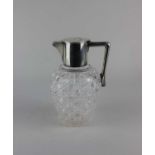 An Edward VII silver mounted cut glass claret jug maker John Grinsell & Sons, Birmingham 1906, the