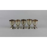 Five George V silver egg cup trophies with engraved inscriptions (a/f) 3.4oz