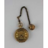 A Continental 18K lady's gold fob watch and fob chain