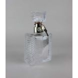 A silver mounted cut glass locking decanter, maker Hukin & Heath, Birmingham 1938, 19cm high, with