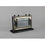 A George V silver mounted desk calendar on wooden base (a/f), maker W J Myatt & Co. Birmingham, 21.