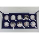 A cased set of ten Slade Hampton's silver Cathedral medallions, Birmingham 1974, 36oz, with booklet