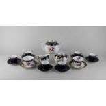 A Doulton Burslem porcelain part tea set with floral decoration and gilt embellishments, to
