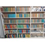 A large collection of Ladybird books fifteen shelves with appoximately 1200 books