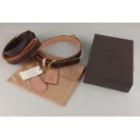 A Louis Vuitton dog collar and lead, with dust bag, boxed