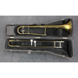 A King trombone, in fitted case, with two associated mouth pieces