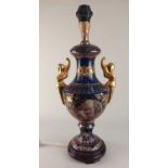A modern Sevres style blue gilt table lamp baluster form with figural handles and two opposing
