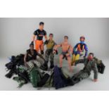 A collection of six various Action Man figures together with a variety of clothes and accessories