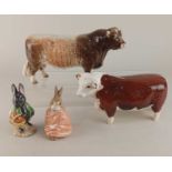 Two Beswick models of Bulls (a/f) and two Royal Albert Beatrix Potter figures 'Little black