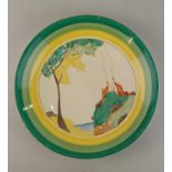 A Clarice Cliff Bizarre pottery plate in red roof pattern 23cm