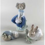 Three Lladro porcelain figures comprising a girl holding a basket of flowers 87.5cm, a rabbit and