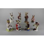 Eight Royal Doulton Bunnykins figures to include King John, Ice Cream, Fisherman and Grandpas story