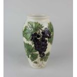 A Moorcroft pottery Collectors Club 'Grapevine' pattern vase 19cm high