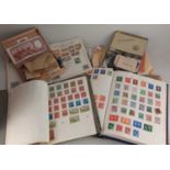 Three albums of British and International stamps, and some loose, to include Iran, USA and Egypt