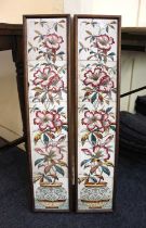 A set of ten Victorian tiles decorated with flowers in vases, framed as a pair, each frame 78cm by