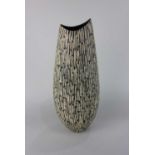 Carolyn Genders (b1957) a grey and cream vase of elongated form and textured surface, incised