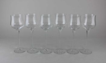 A set of six Orrefors style wine glasses each with slender tapered stem, by repute purchased in