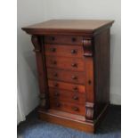 A Victorian mahogany collector's cabinet of seven drawers in the style of a Wellington chest 65cm
