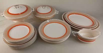 An H & K Tunstall Art Deco part dinner service with orange striped decoration, to include two