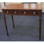 A Victorian mahogany rectangular side table with two drawers and brass drop ring handles on ring