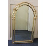 A Venetian style modern gilt framed wall mirror 112cm by 64cm