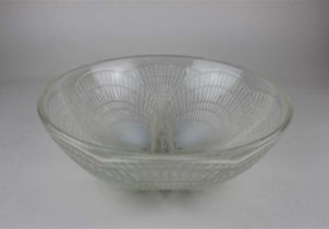 A Rene Lalique 'coquilles' opalescent glass bowl, engraved 'R LALIQUE FRANCE', 24cm diameter