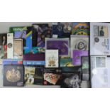 A collection of Royal Mint commemorative proof coin sets to include Royal Annivesaries, Rugby 1999