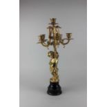 A gilt five branch candelabra, the stem modelled as a putto, 59cm high including base (a/f)