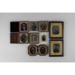 A collection of daguerreotypes and ambrotypes, cased and part cased, to include a framed pair