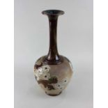 A Royal Doulton Slaters Patent stoneware bottle vase decorated with blossom and scrolling foliage,