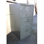 A grey metal three drawer filing cabinet 47cm