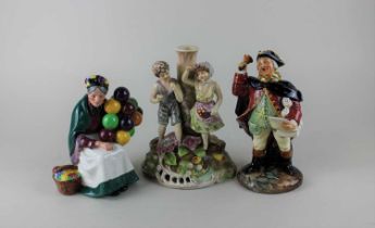 Two Royal Doulton figures; The Old Balloon Seller and Town Crier, together with a porcelain