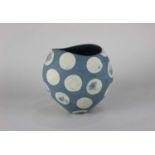 Carolyn Genders (b1957) a blue and cream vase with textured spotty surface, incised signature to