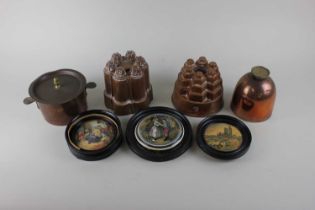 Two Victorian copper jelly moulds to include a Trottier Paris turreted example 13cm high, and a